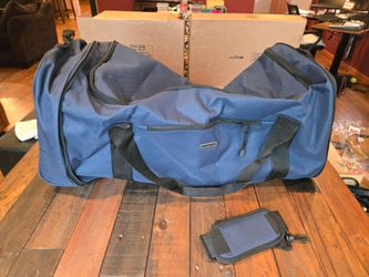 Travelers Club 32 inch Collapsible Rolling Duffel, brand new