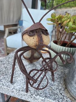 Guitar playing garden art