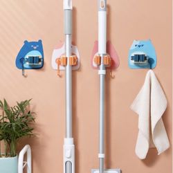 4 Pcs Wall Mounted Mop & Broom Holder - Self-Adhesive, No-Drill Hanger for Mops, Rakes, Dustpans