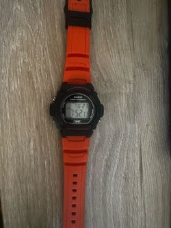 Orange casio watch