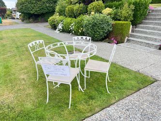 Wrought Iron Table and Four Chairs