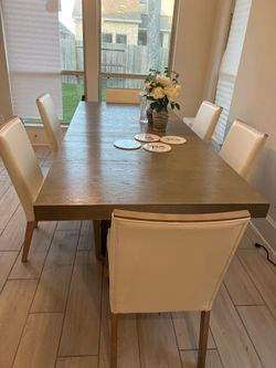 Modern wooden table with chairs