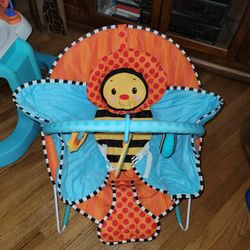 Sassy Cuddle Bug Bouncer. Bumble Bee Baby Bouncer Chair