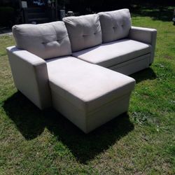 ** BEAUTIFUL SECTIONAL WITH STORAGE AND SLEEPER PULL-OUT 