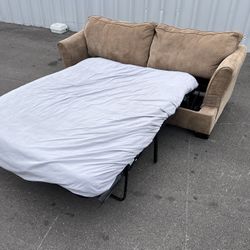 Tan pull out bed Couch sectional couch sofa (FREE CURBSIDE DELIVERY )