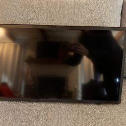 24” Flatscreen TV with Remote