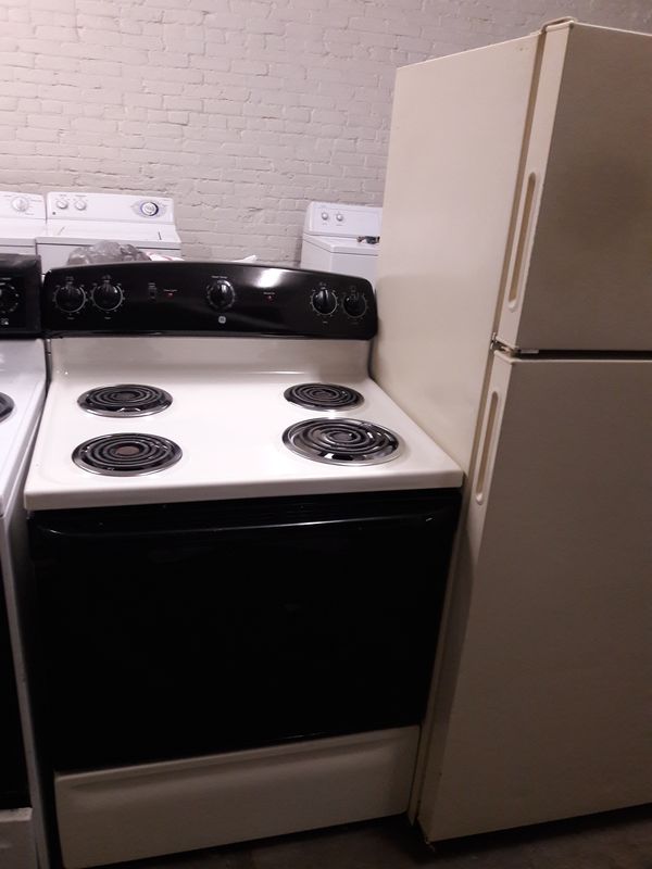Nice clean GE BISQUE colored stove.125 DELIVERED INSTALLED AND 4 MONTH