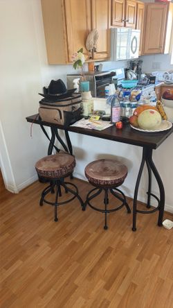 Two stools with table/bar $150