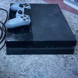 PS4 with controller 