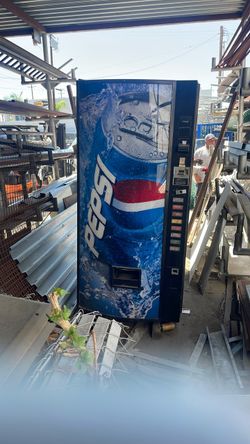 Soda and candy dispenser
