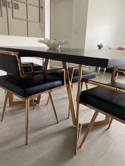 Gorgeous Dining Room Black Wood Table and Chairs with Gold Treated Accents