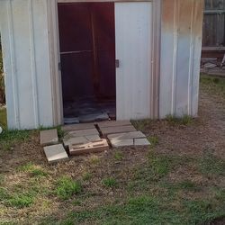Shed 5 feet by 8 feet. Bricks that covers the floor are included