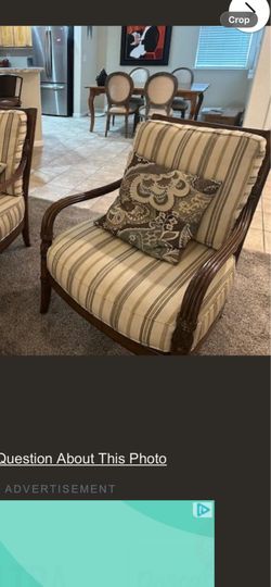 2 nice chairs and a cool table with marble