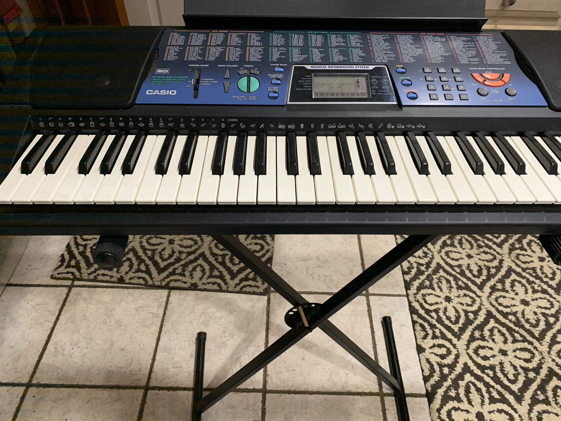 Casio keyboard Model 511. Stand and seat included. Excellent condition