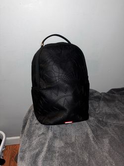 Spray ground backpack