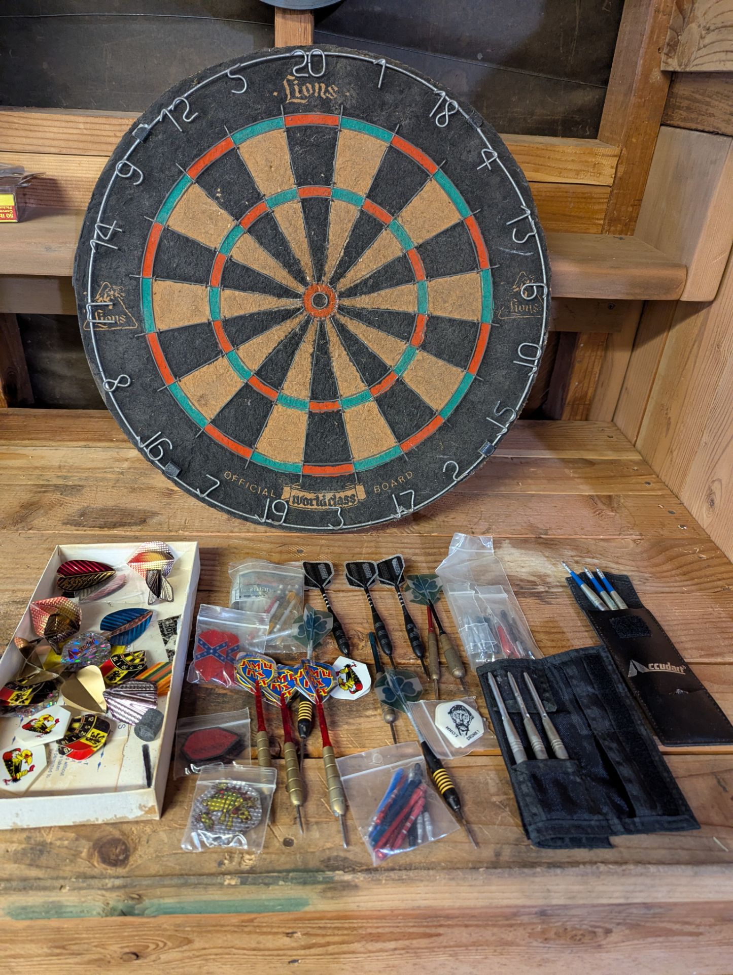 Vintage dartboard and darts