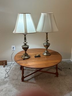 2 brass lamps