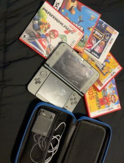 Nintendo 3DS with five games carrying case and charger Nintendo 3DS with five games carrying case and charger