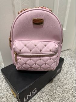 Claire’s pink studded mini back pack purse