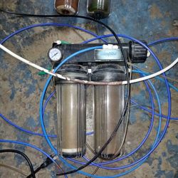 Two reverse osmosis water  filtration units.