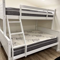 Twin/full bunk bed. $350 bunk only. $550 with mattresses. Assembly required. Assembly not included. Tax included. Free local delivery.