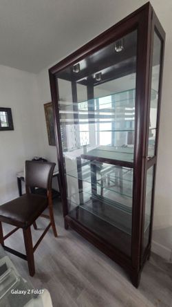 "It is a glass display cabinet with built-in lights."