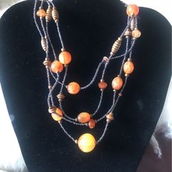 Tibetan Silver Tone Lucite Bead Necklace. Amber, large barrel, round beads. Silver Repoussee Long, Round, Large and SmallBeads Four Strands