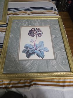 Vintage gold framed pair of floral artwork