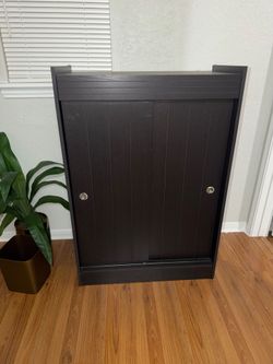 Black Wood Cabinet with Sliding Doors