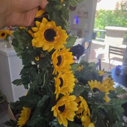 4 - Artificial Sunflower Garland 66 in long. $15 for all 4 or $5 for 1.