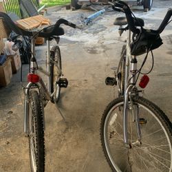2 Bicycles One For Him And One For Her Silver Color Aluminum 
