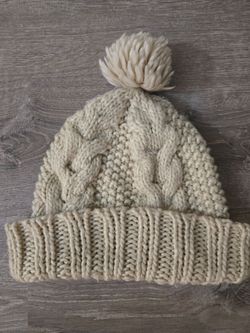 Cream Colored winter beanie with pom