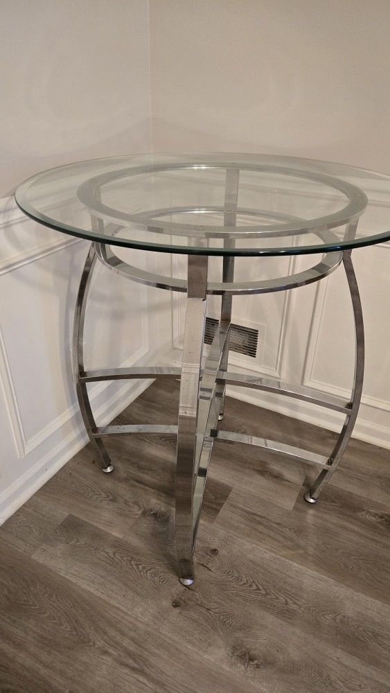 Tall Glass Kitchen Table-
Need gone by 7/9
