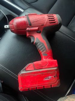 Milwaukee 1/2 inch impact and like new battery 8.0