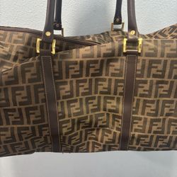 Louis Vuitton And Fendi Luggage Bags