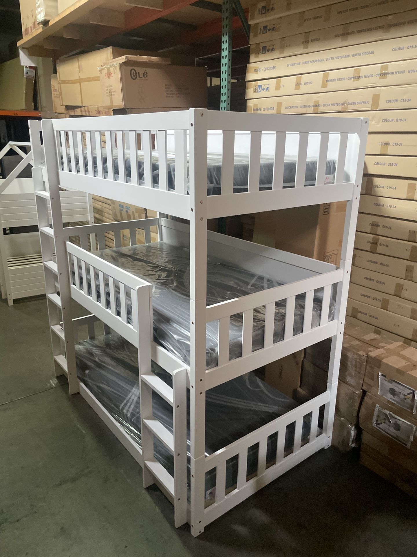 Triple bunk bed. Available in white & espresso. Assembly required. Assembly not included. Taxes included. Free delivery. Bunk bed only-$450 Bunk bed