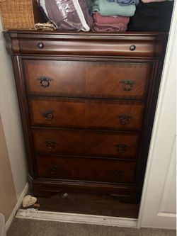 Chest dresser, end end table and a media type dresser