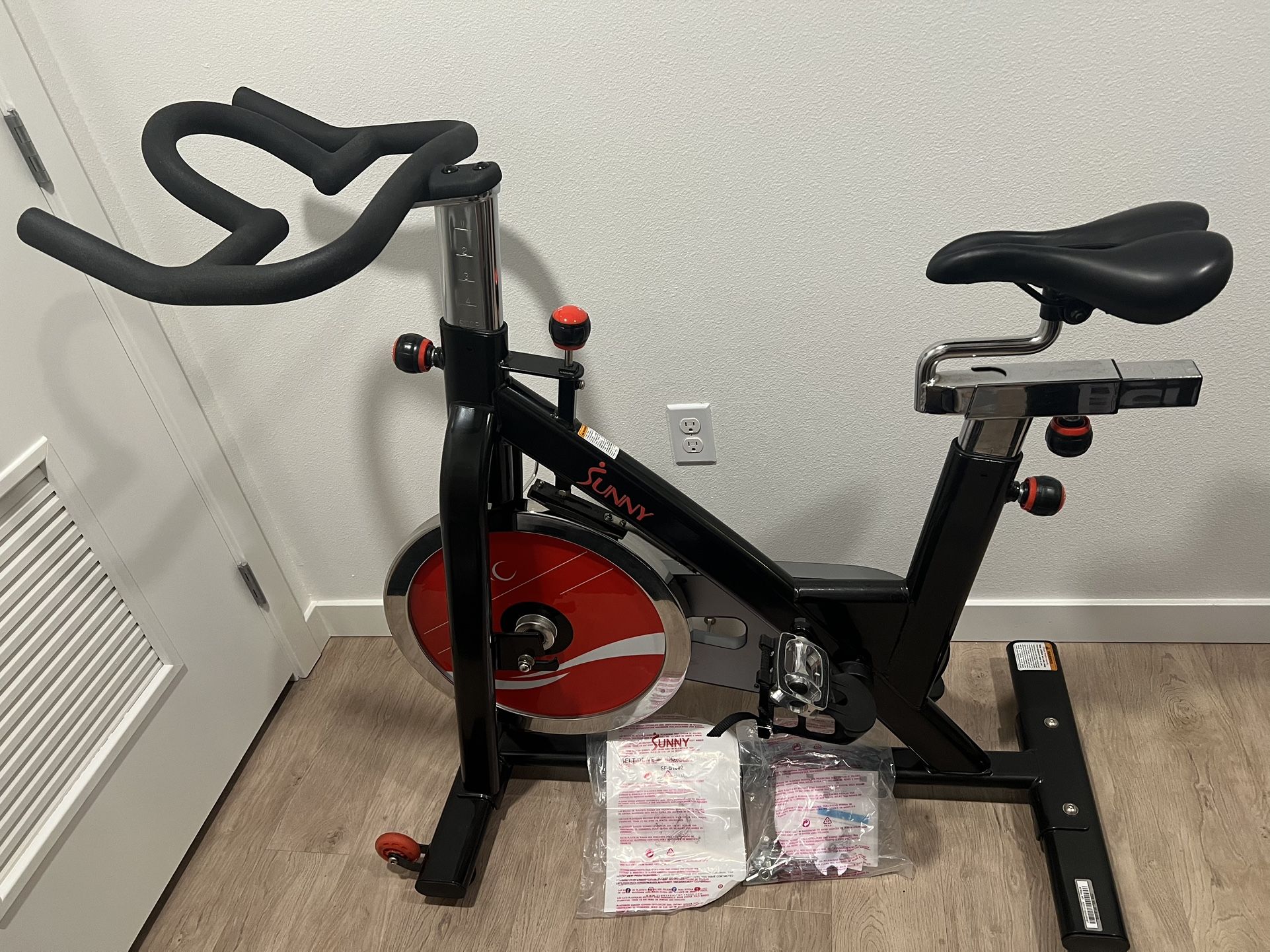 Sunny Health & Fitness Indoor Stationary Belt Drive Cycling Exercise Bike