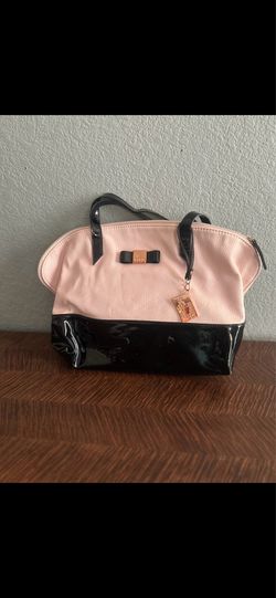 Pink and black purse