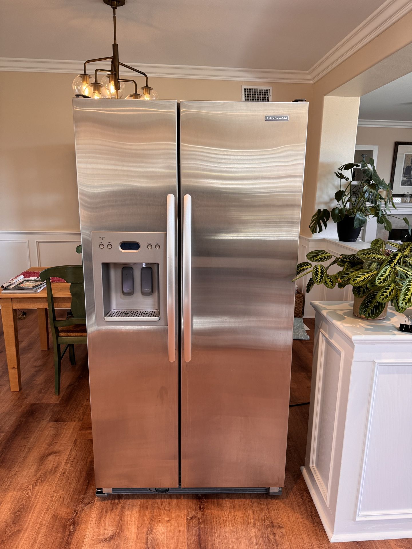 Side-by-side, full-size KitchenAid refrigerator and freezer