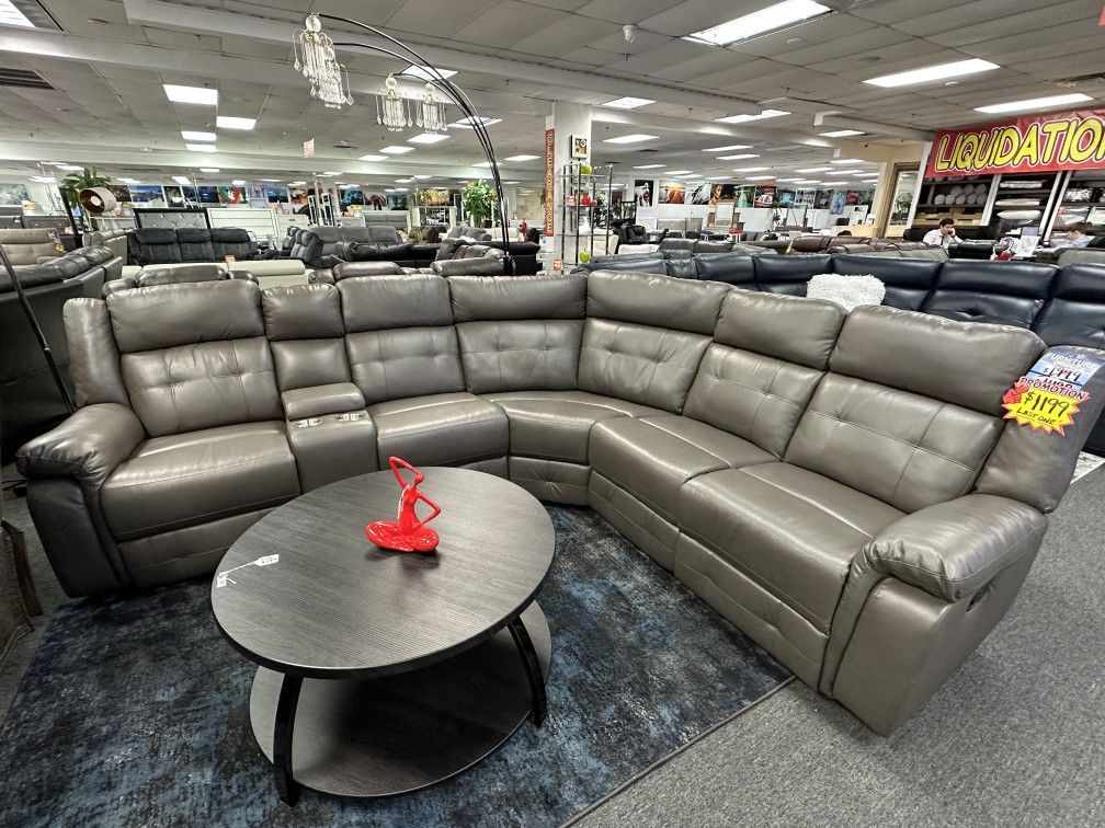 Grey Manual Reclining Sectional Available Now On Memorial Sale!