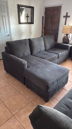 Blue couch with chase which can be used on left or right side