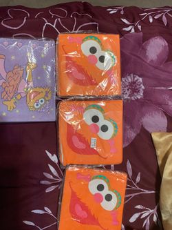 4 packs of napkins 3 beverage and 1 luncheon Sesame Street