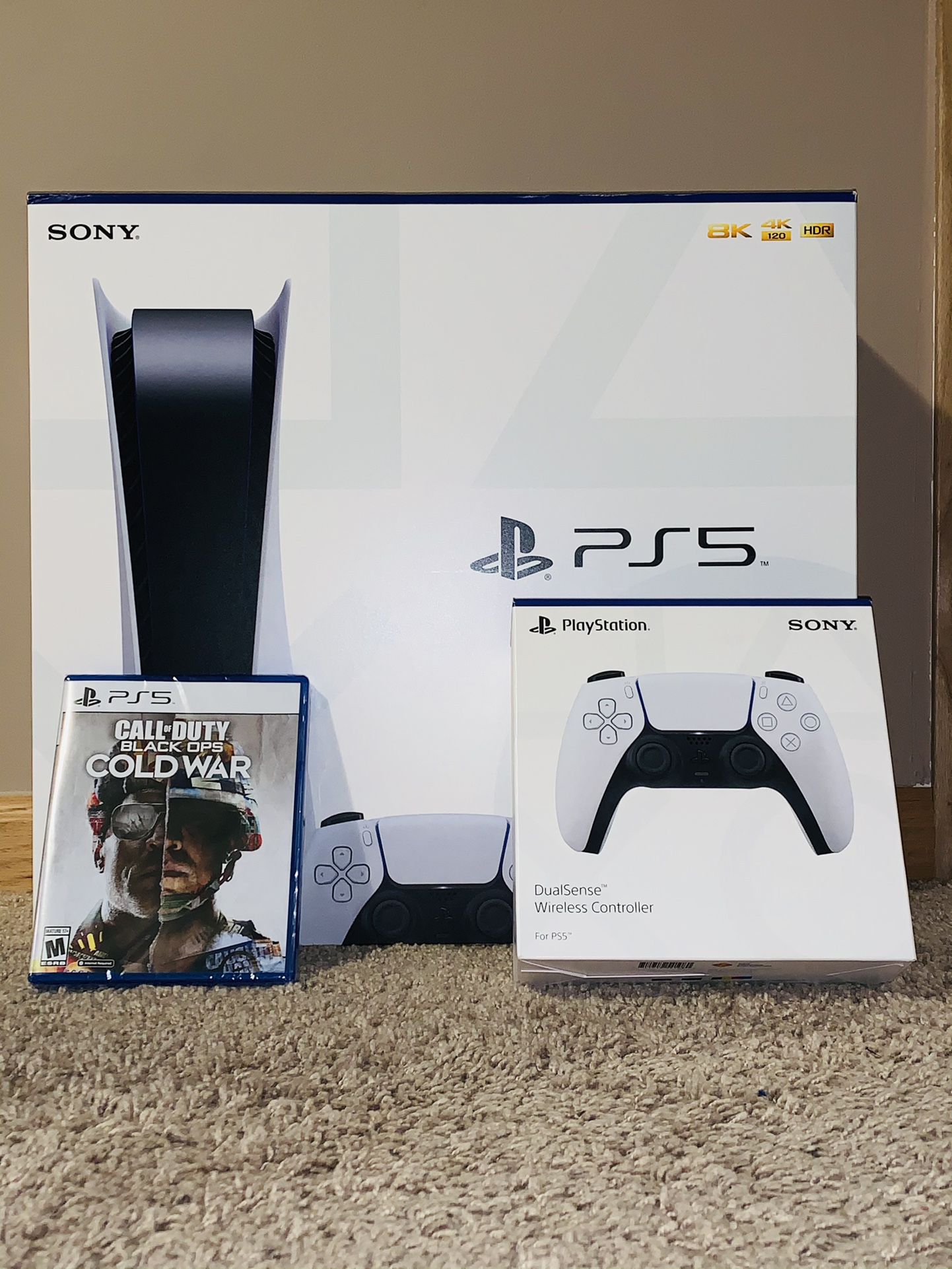 PS 5 with, extra controller, and Call of Duty Black OPS Cold War video game.