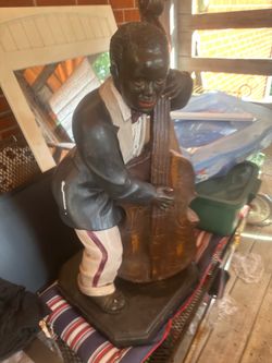 Vintage  bass musician statue