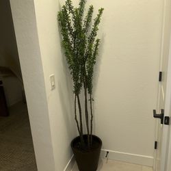 Faux plant with pot 