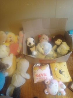 18 stuffed animals and pillows