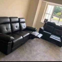 Manual Reclining Sofa and Loveseat. 