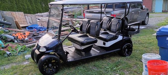 Six person EZ-Go golf cart