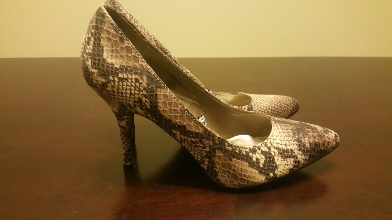 Have a sexy pair of mossimo python for sale!! Heels are sz 10.